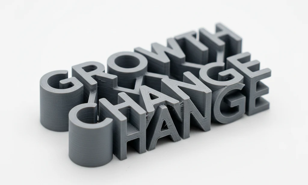 A photo of a finished 3D printed ambigram object showing its physical form